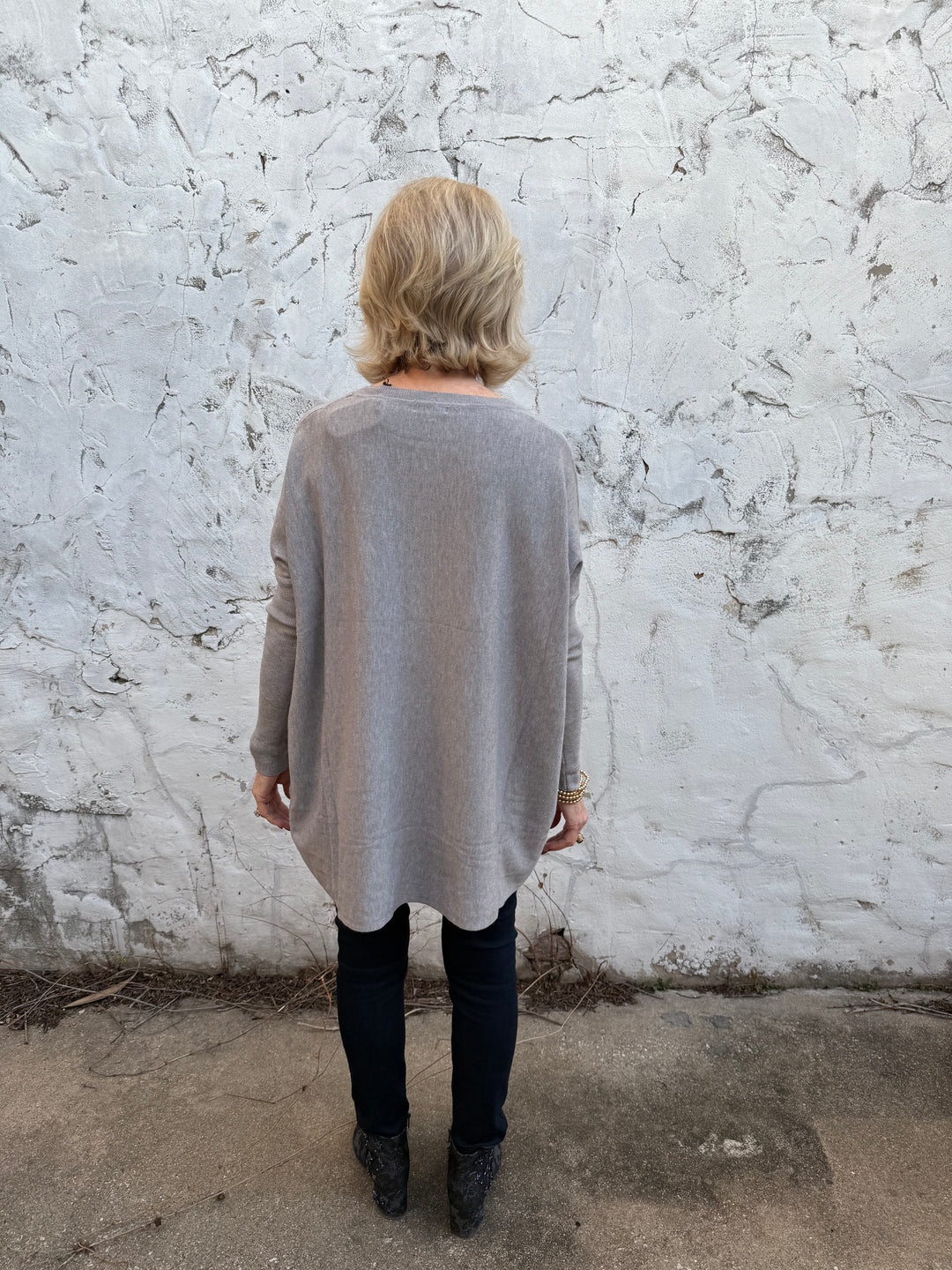 Amelia Oversized Pocket Sweater Top in light gray, available in sizes S-XL. Features pocket detail and relaxed fit.