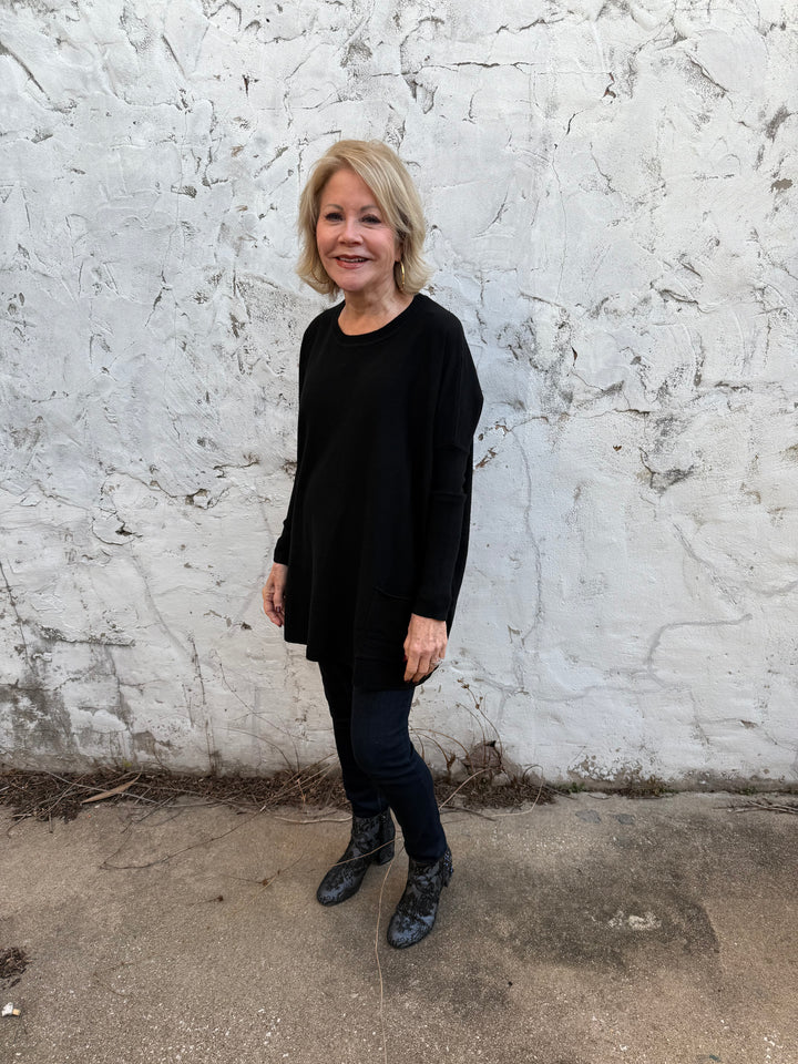 Amelia Oversized Pocket Sweater Top, available in S-XL. Features relaxed fit and front pocket.