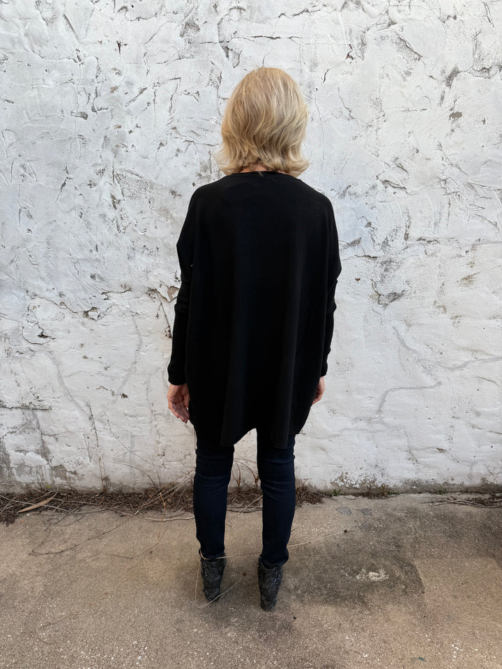 Amelia Oversized Pocket Sweater Top shown from back. Available in sizes XS-XL.