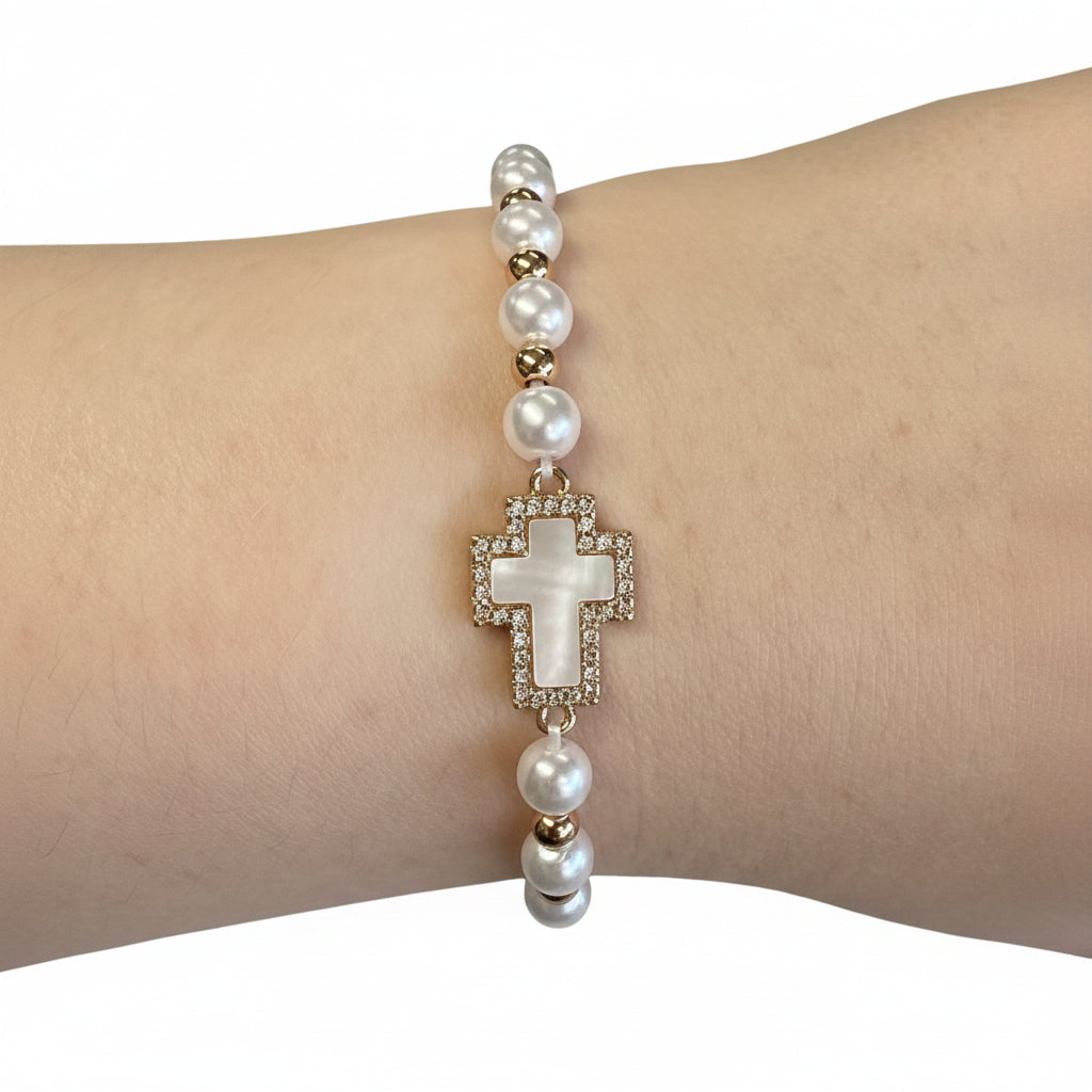 Beaded Gold Stretch Bracelet with white pearls, gold beads, rhinestone cross charm. Available in S, M, L sizes.