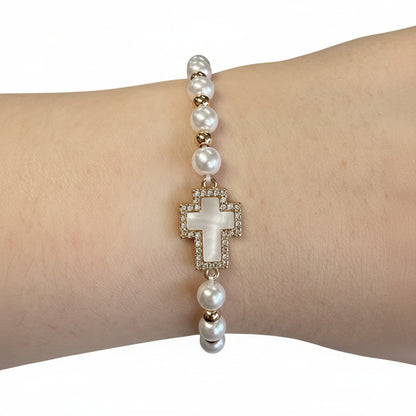 Beaded Gold Stretch Bracelet with white pearls, gold beads, rhinestone cross charm. Available in S, M, L sizes.