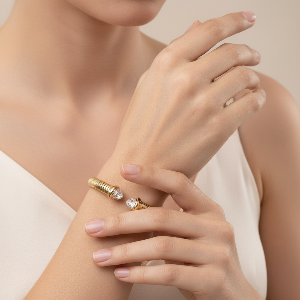 Stainless Steel Gold Dipped Cuff Bracelet with diamond accents, available in sizes S, M, and L.