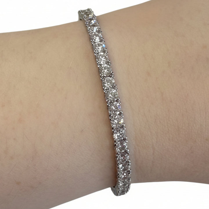 Dipped Metal CZ Hinge Bracelet, slim silver band with a row of round cubic zirconia. Available in S/M and M/L sizes.