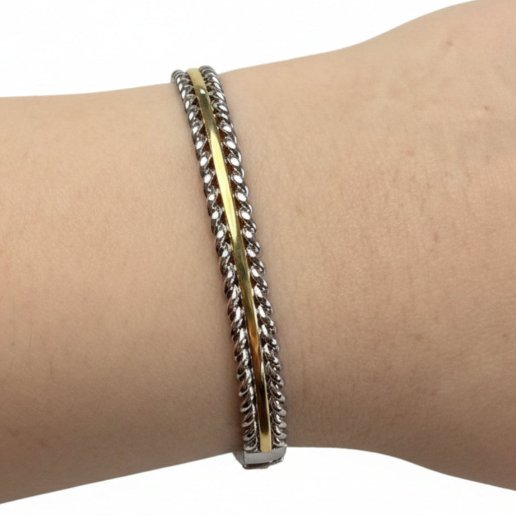 Hinge Bangles: central gold band, two twisted silver bands in silver and gold finishes. Available in S, M, L sizes.