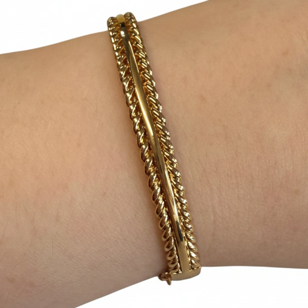 Gold Hinge Bangles with smooth central bar and twisted rope edges. Available in small, medium, and large sizes.