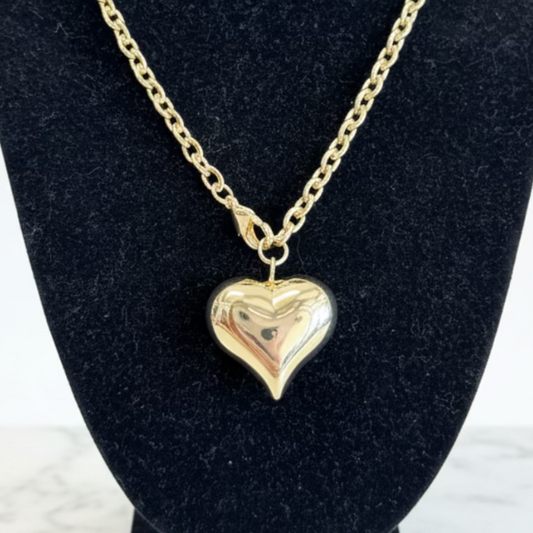 Stainless Steel Gold Dipped Heart Necklace with shiny heart pendant; available in 16", 18", and 20" sizes.