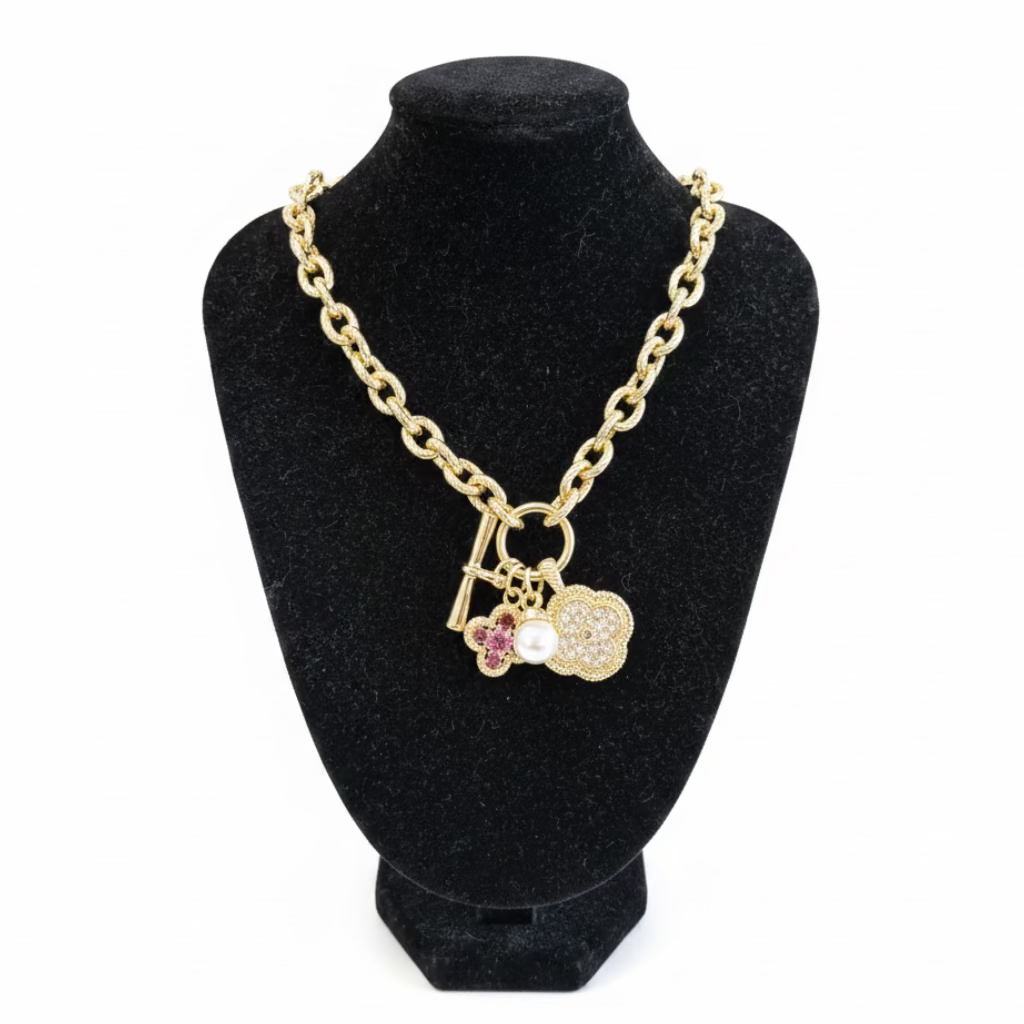 Multi Pendant CZ Chain Necklace with lock, pearl, gold floral crystal charm, and pink flower. Available in 16", 18", 20".