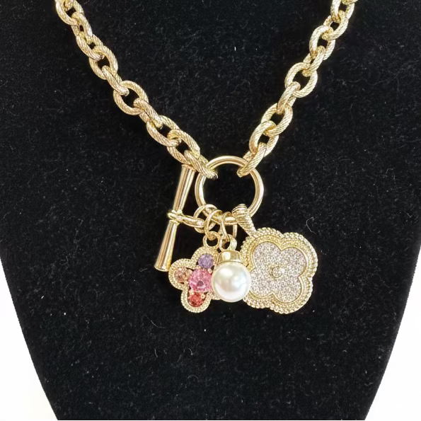 Gold Multi Pendant CZ Chain Necklace with toggle clasp, three charms: pearl, gemstone flower, sparkling quatrefoil. Sizes: S/M/L.