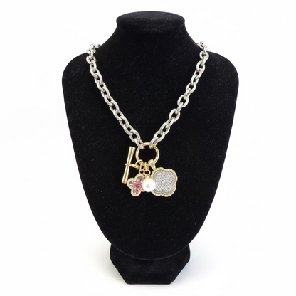 Multi Pendant CZ Chain Necklace with silver, gold, pearl, and pink flower charms. Available in 16", 18", and 20" lengths.