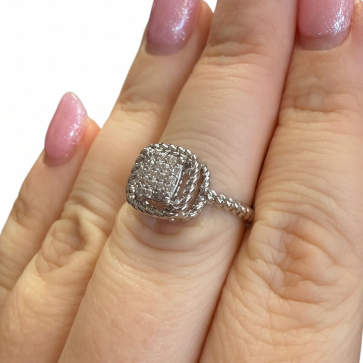 The Ring Edit: silver statement ring with square diamond cluster and twisted band. Available in sizes 5-9.