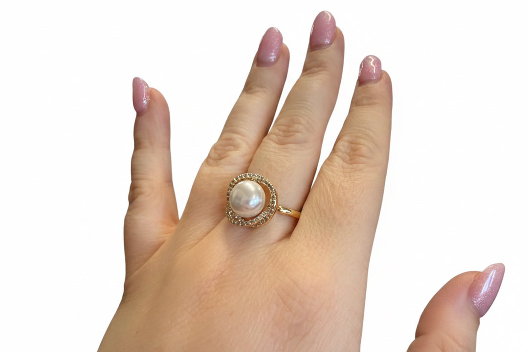 The Ring Edit: gold statement ring with a large pearl and sparkly stones. Available in sizes 5-9.