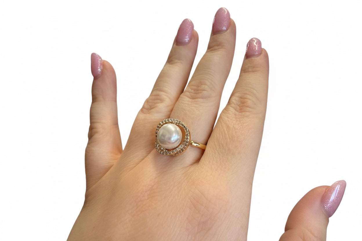 The Ring Edit: gold statement ring with a large pearl and sparkly stones. Available in sizes 5-9.