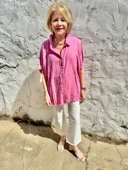 Pink Linen Button Down Top with Fray Details. Available in sizes XS–XL.