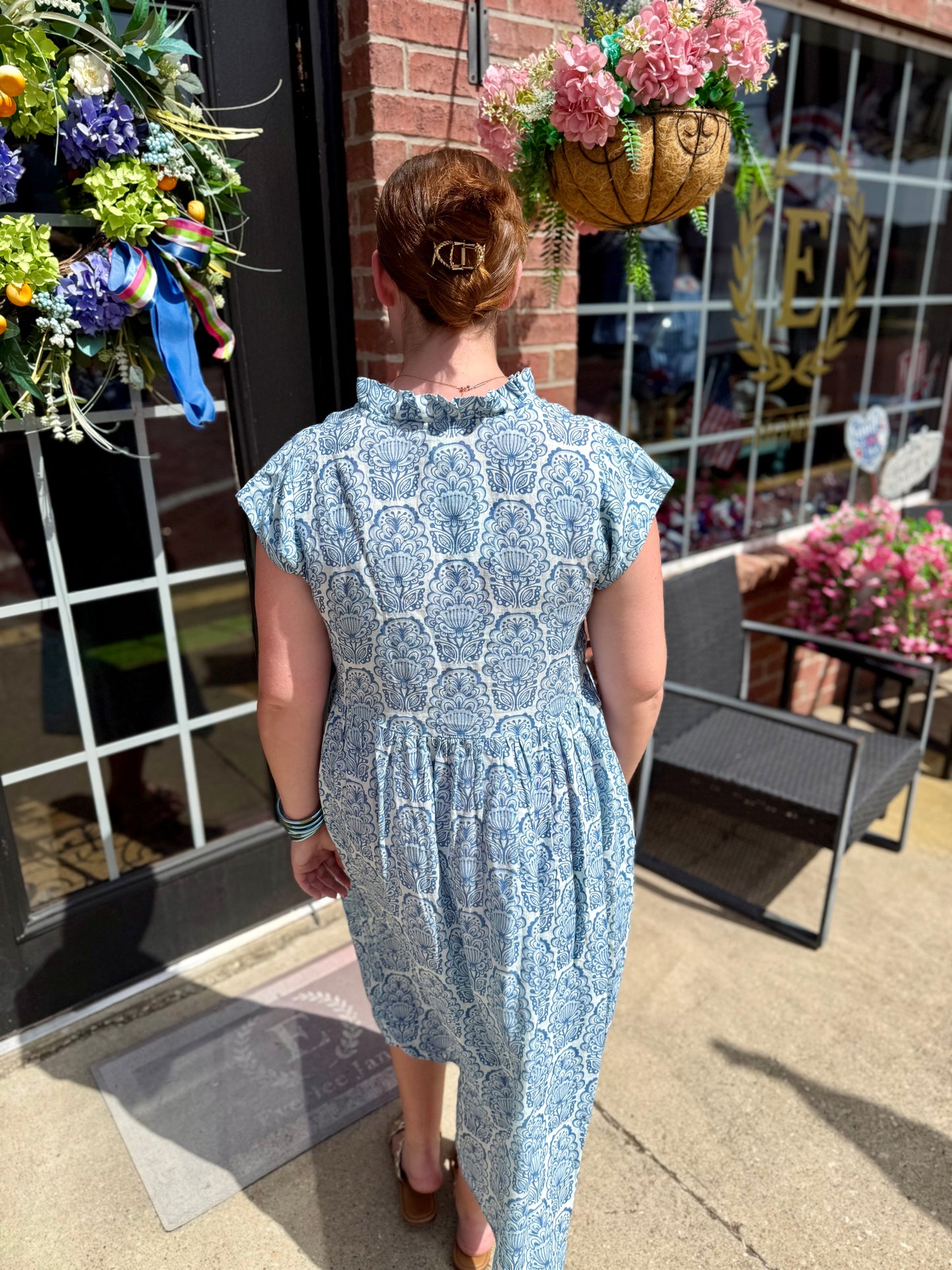 Linen Blues Dress in soft blue linen, sleeveless, available in sizes XS–XL.