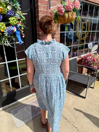 Linen Blues Dress in soft blue linen, sleeveless, available in sizes XS–XL.