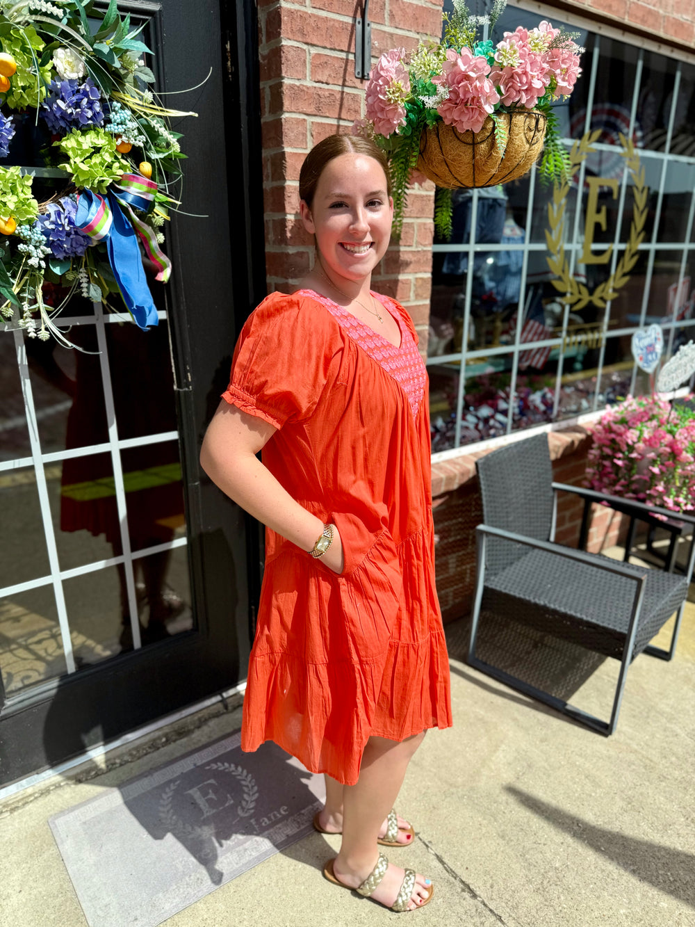 Daisy Filled Yoke Dress with floral design; available in sizes XS-XL.