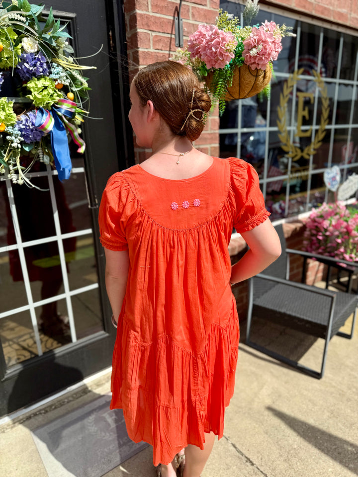 Daisy Filled Yoke Dress with embroidered floral back detail. Available in sizes XS–XL.