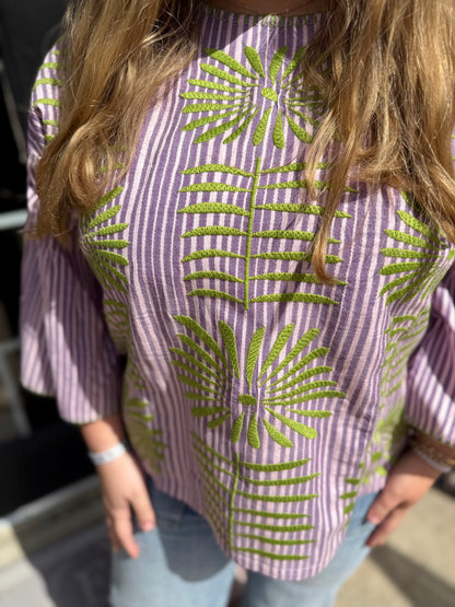 Purple Elena Blouse: striped cotton, green embroidered leaves. Available in sizes XS–XL.