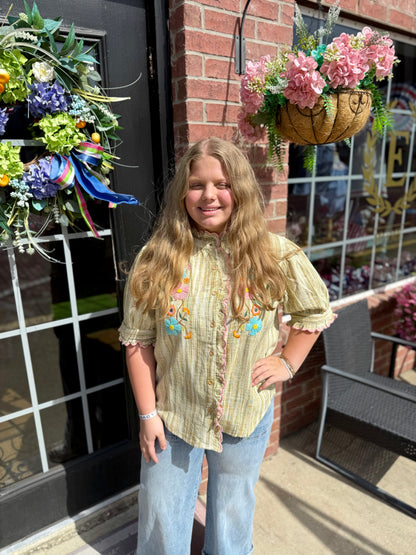Ribbon Embroidered Blouse in light, breathable cotton with floral embroidery. Available in sizes XS-XL.