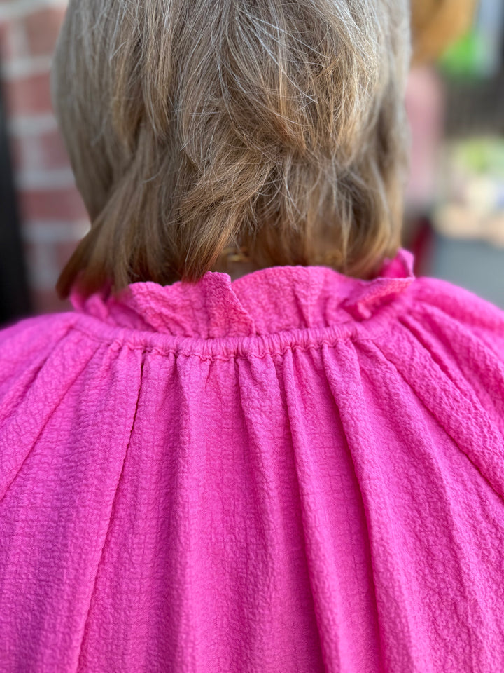 Melissa Peony Embroidered Tiered Dress: textured, bright pink babydoll style with gathered neckline. Available in sizes XS–XL.