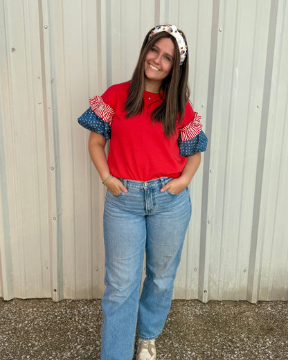 Liberty Ruffle Accent Puff Sleeve Top shown; available in sizes XS–XL.