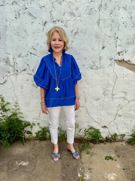 Blue Belle Lace Trim Blouse with lace detailing. Available in sizes XS–XL.