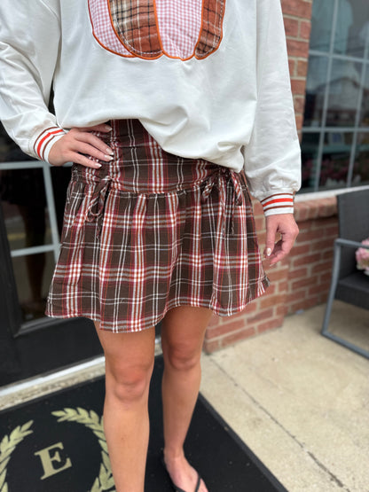 Pumpkin Patch Plaid Flannel Skort in cozy fall colors, available in sizes XS-XL.
