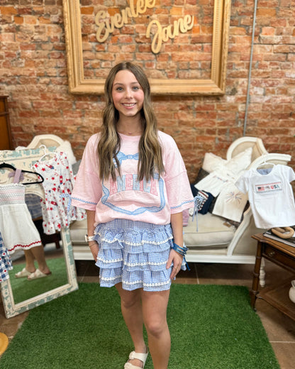 Americana Gingham Bow T-Shirt with bow detail; available in sizes XS–XL.