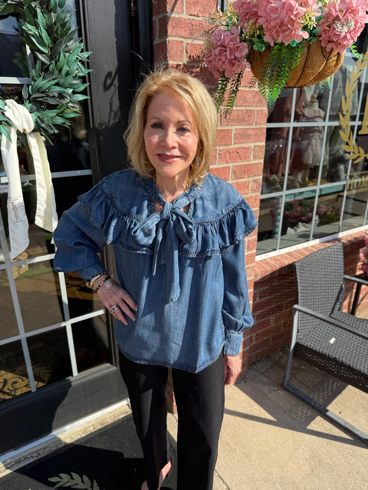 Denim Bow Top in blue, available in sizes XS–XL.