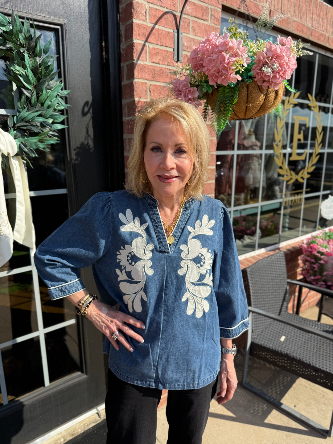 Ellie Washed Denim Floral Top with 3/4 sleeves, available in sizes S-XL.