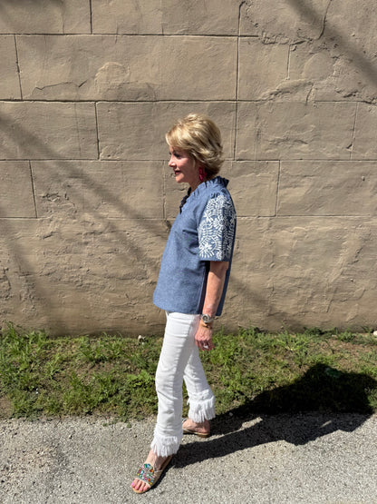 Denim Floral Top in sizes XS-XL, features floral pattern on denim fabric.