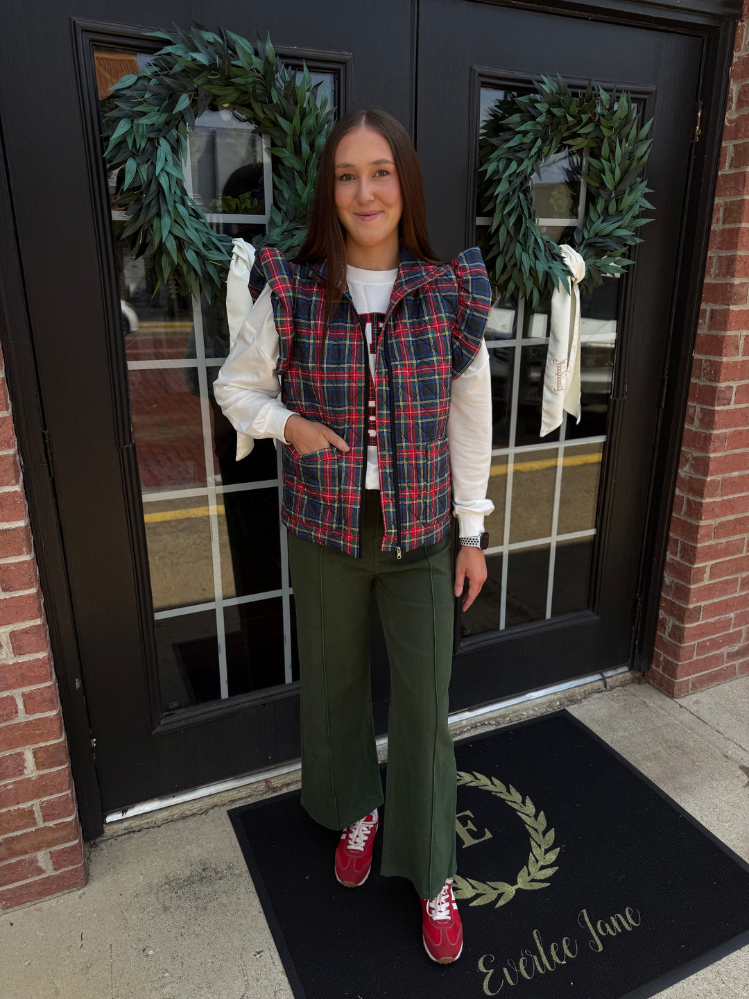 Plaid Tidings Puffer: colorful plaid pattern, available in sizes XS–XXL.