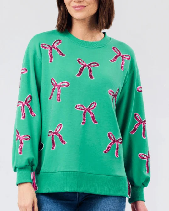 Lakelyn green sweatshirt with sparkly pink sequined bows. Sizes available.