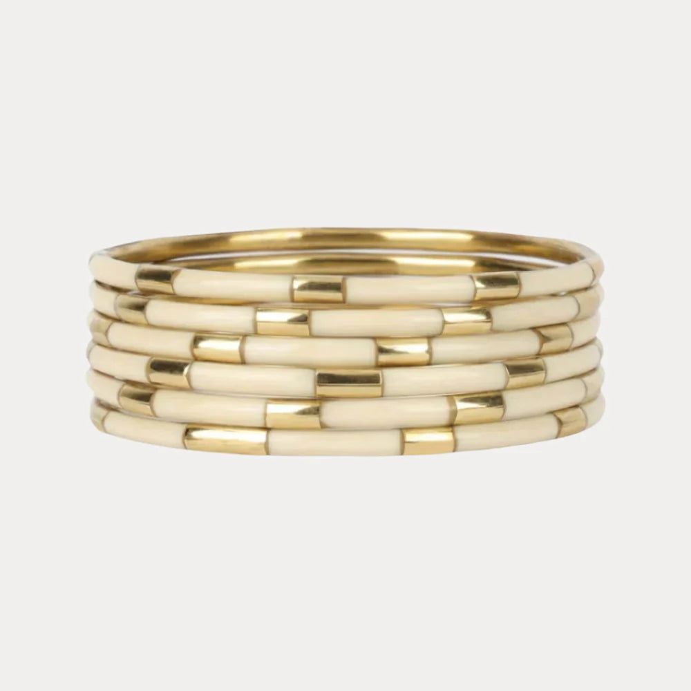Ivory Veda Stack: gold and cream BuDhaGirl enamel bangle with segmented tubular design. Available in S, M, L sizes.