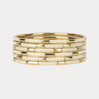 Ivory Veda Stack: gold and cream BuDhaGirl enamel bangle with segmented tubular design. Available in S, M, L sizes.