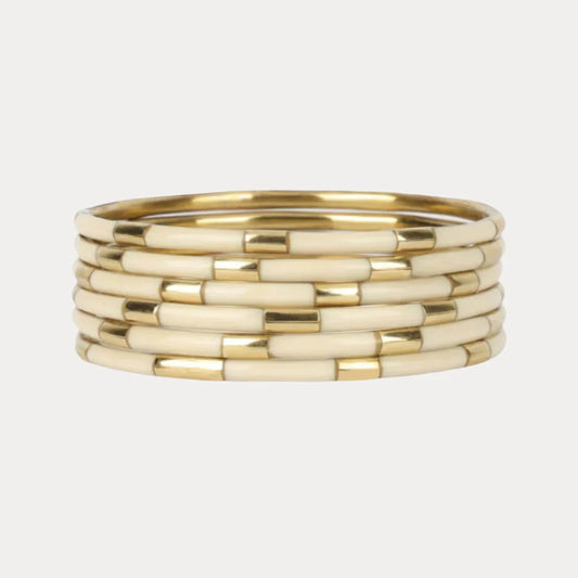 Ivory Veda Stack: gold and cream BuDhaGirl enamel bangle with segmented tubular design. Available in S, M, L sizes.