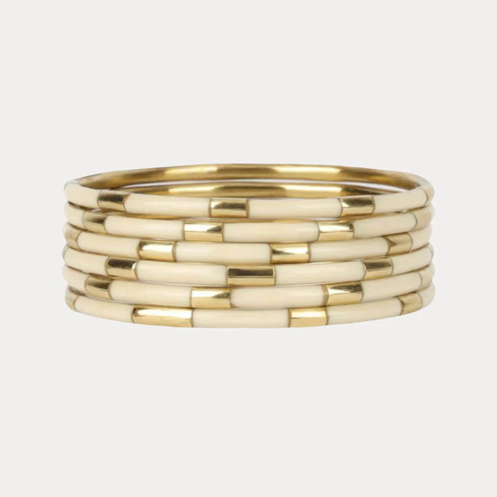 Ivory Veda Stack: gold and cream BuDhaGirl enamel bangle with segmented tubular design. Available in S, M, L sizes.