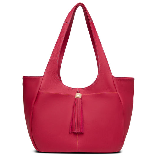 Bright pink leather tote with wide straps, zippered top, tassel, spacious interior. Available in small and large sizes.