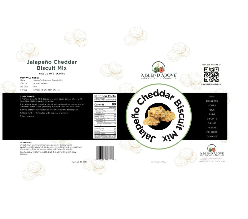 White label for Jalapeño Cheddar Biscuit Mix, with ingredients, baking instructions, nutrition facts, and images of spicy biscuits. "A Blend Above" logo in top right and bottom right corners. Available in 16 oz and 32 oz sizes.