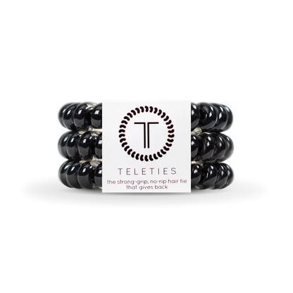 Three black coiled hair ties by TELETIES offer a stylish, strong-grip, no-rip solution. Available in small and large sizes.