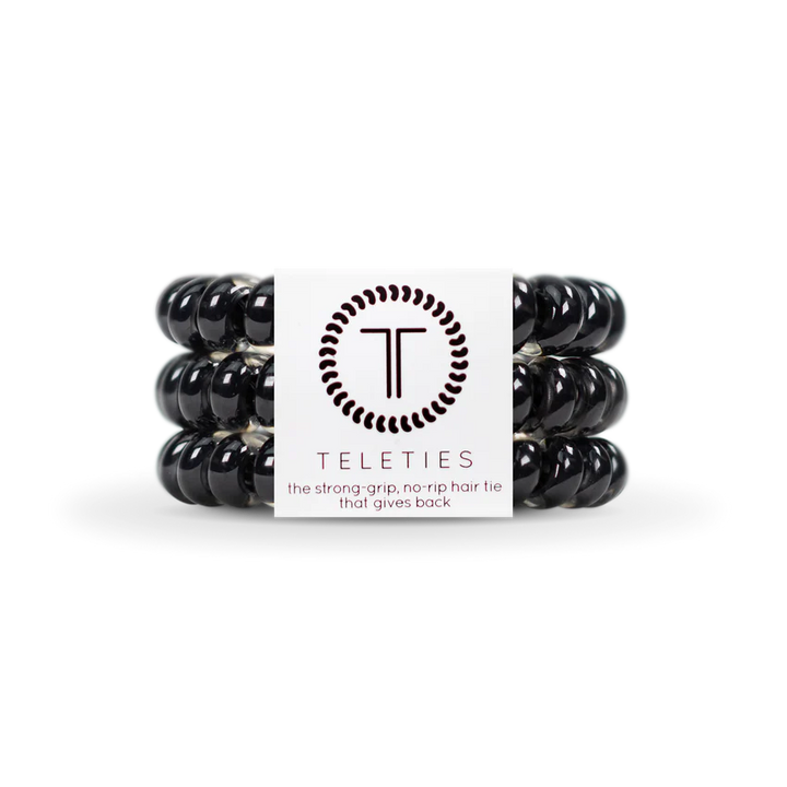 Three black coiled hair ties by TELETIES offer a stylish, strong-grip, no-rip solution. Available in small and large sizes.