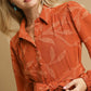 Piper Jacquard Dress with Tie Waist in rust leaf pattern, available in sizes XS-XL.