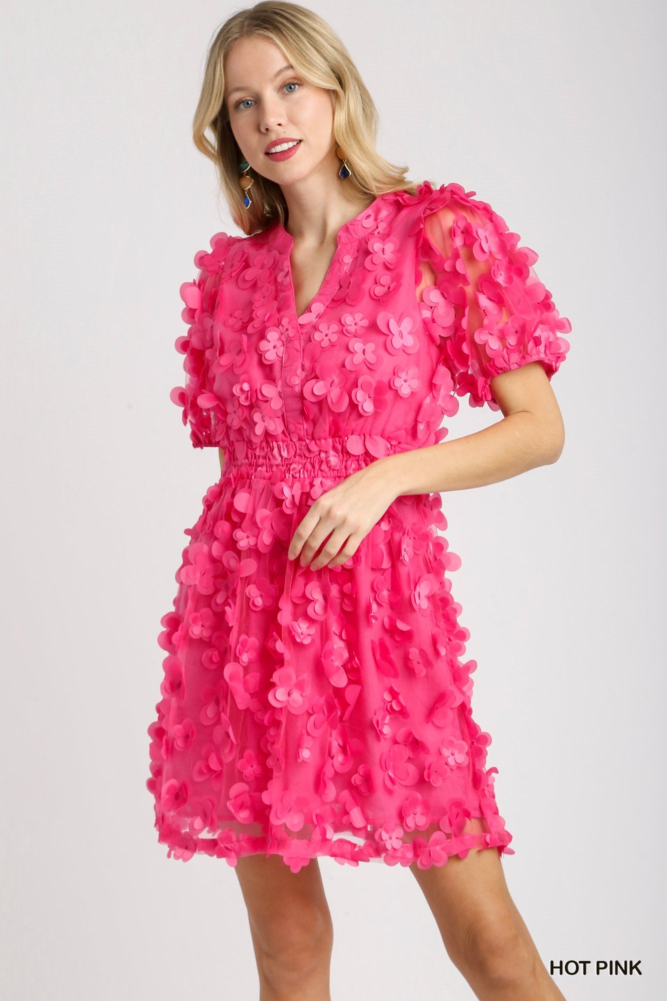 The Butterfly Organza Dress with Elastic Waistband & Balloon Sleeves is available in sizes small, medium, and large. This dress features an elastic waistband and a lightweight, airy texture.