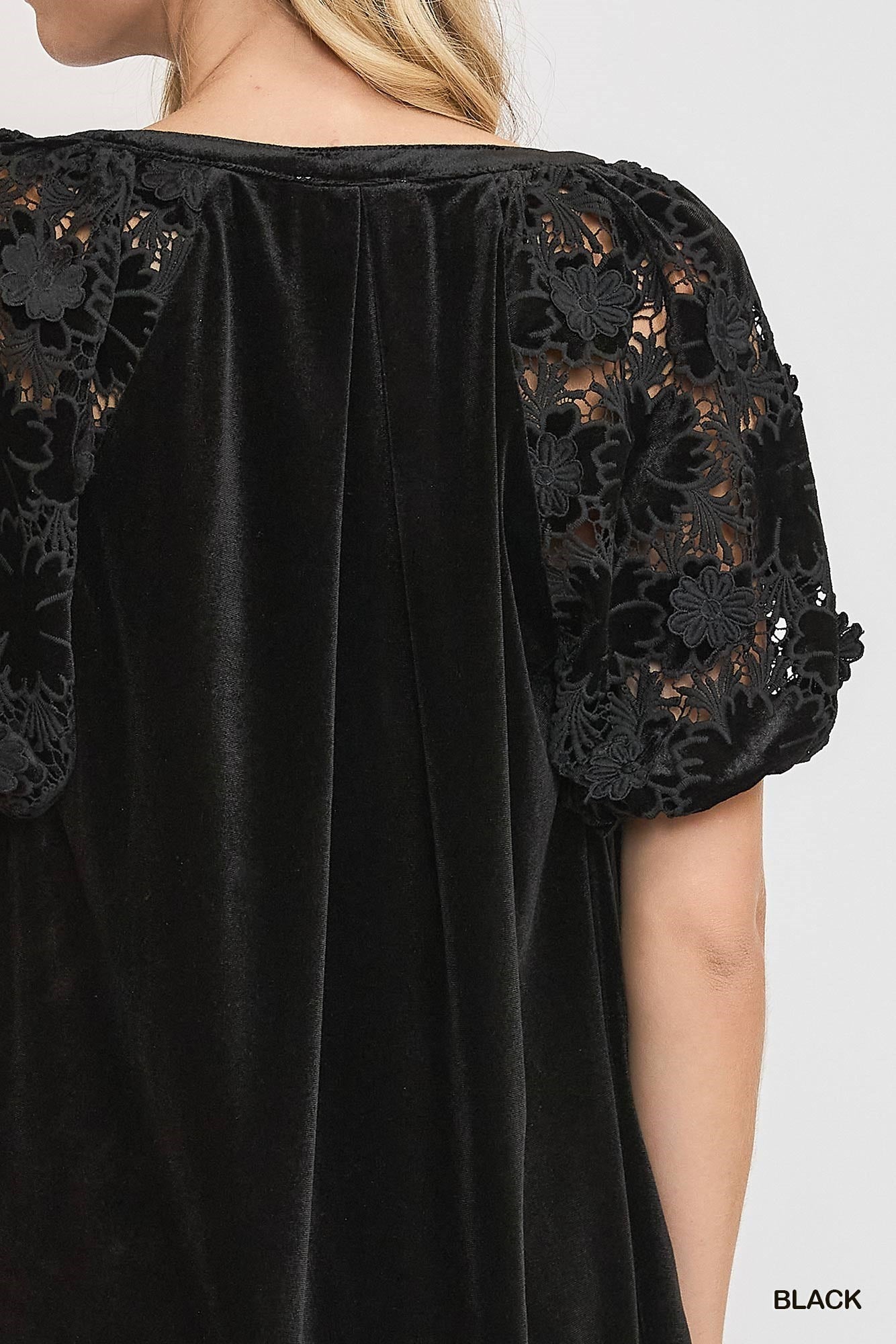Split Neck Velvet Top
- Luxurious velvet fabric
- Lace sleeves with floral detailing
- Sizes: S, M, L, XL
Color: Black