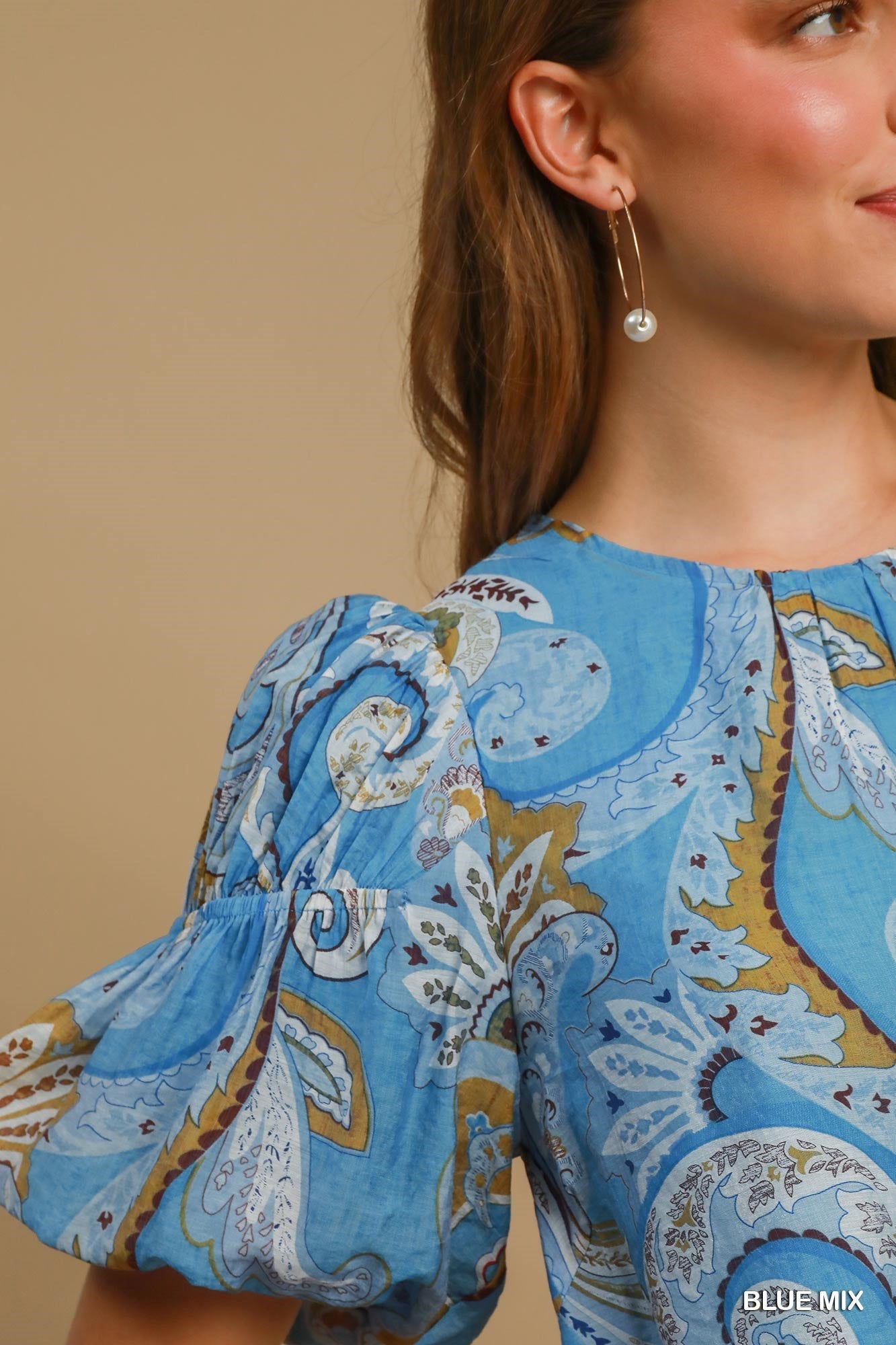 Paisley Blue Mix Babydoll Dress with puffed sleeves and paisley print. Available in sizes XS–XL.