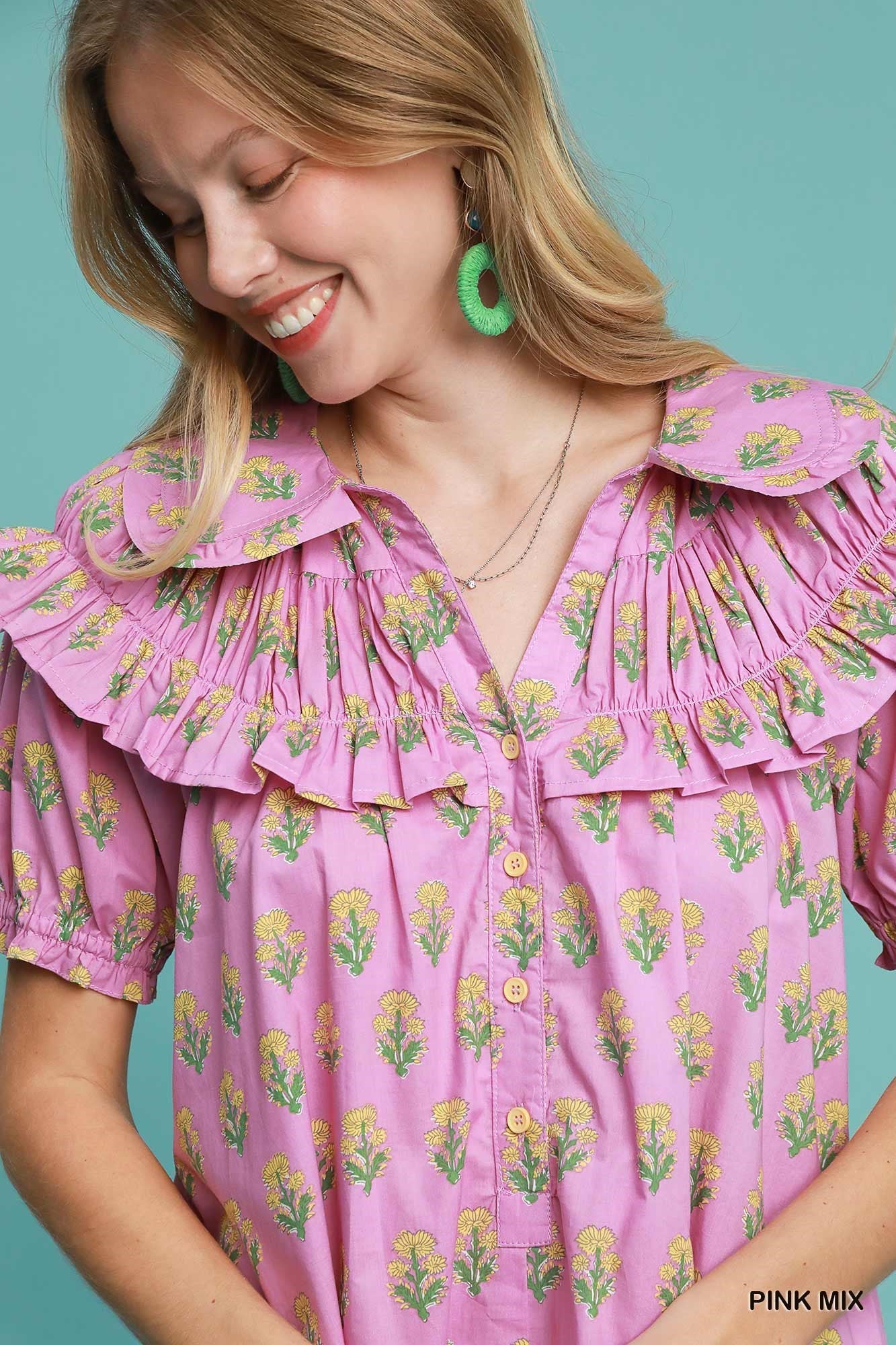 Bubble Sleeve Dress: ruffled floral mini, puff sleeves, yellow buttons. Available in sizes XS–XL.