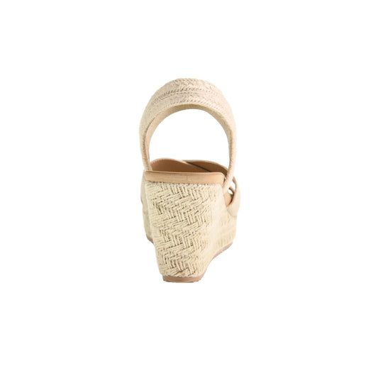 The Key Word Espadrille Wedge Sandal in Natural features a stretch gore, jute-wrapped heel, rear ankle strap, open-toe design, and platform sole. Available sizes: 6-10.