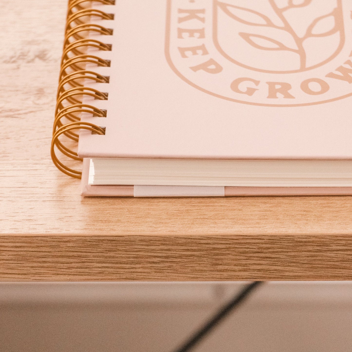 Pink scratch-resistant Keep Going Keep Growing Hardcover Journal with spiral binding, lined pages; sizes: A5, B5.