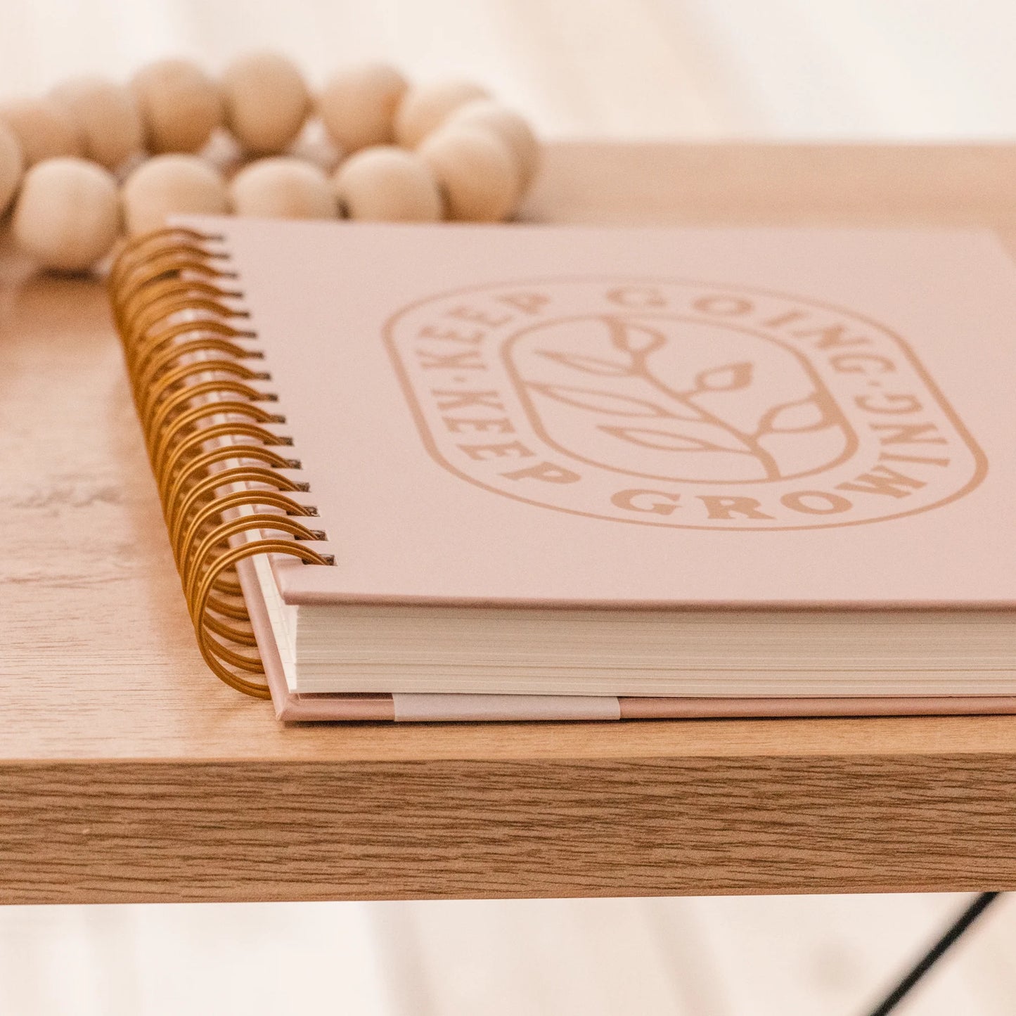 Keep Going Keep Growing Hardcover Journal with pink scratch-resistant cover, lined pages, available in multiple sizes.