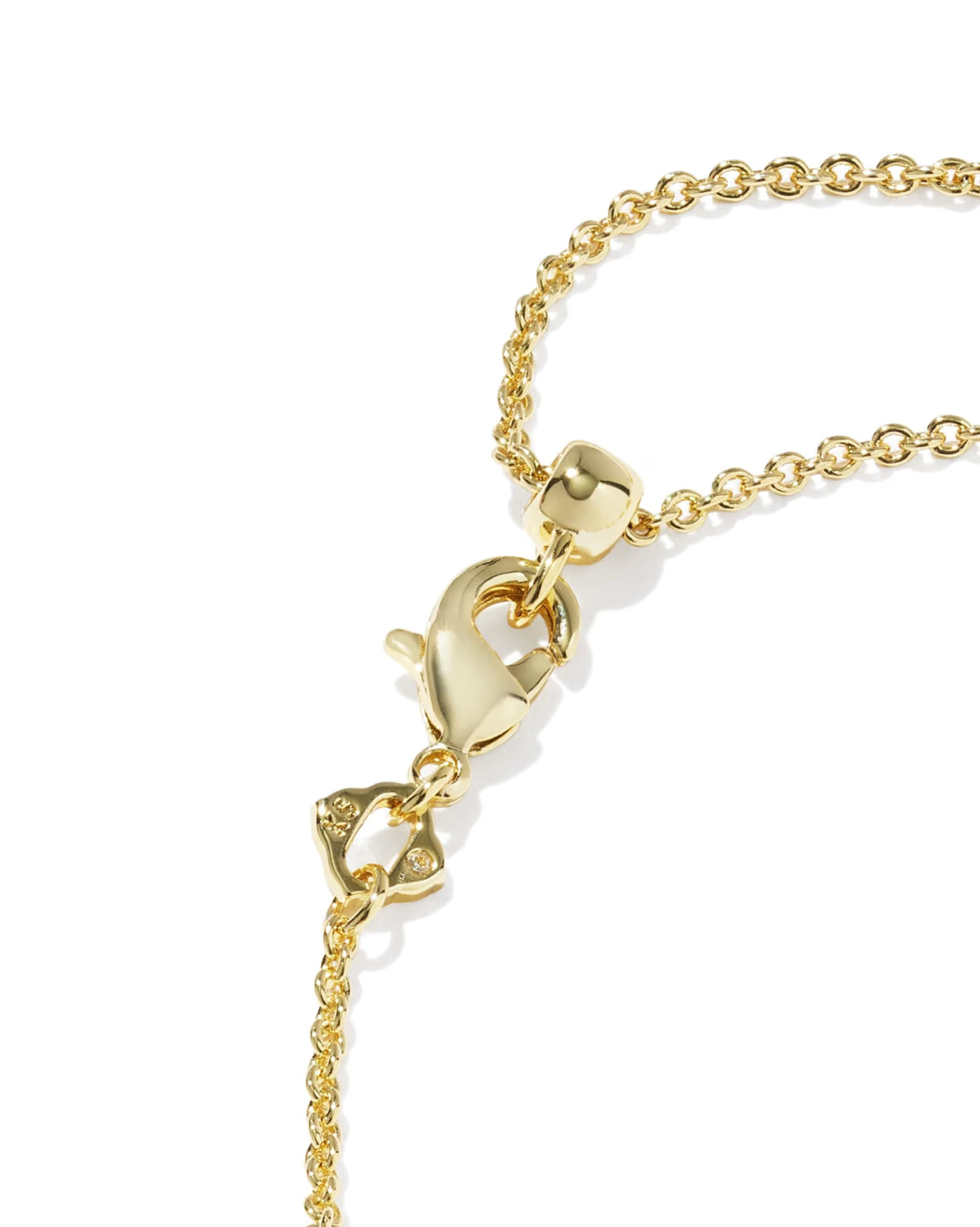 Elaina Gold Link Bracelet in Rose Quartz by Kendra Scott features a secure lobster clasp and polished, rounded chain links. Available in standard and extended sizes.
